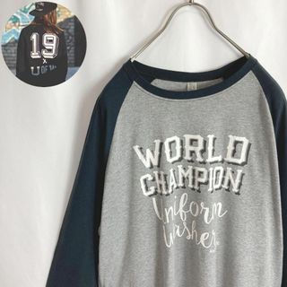 ジャージーズ(JERZEES)の古着 ラグランTシャツ 七分袖 ワールドチャンピオン 英字 グレー 黒色 2XL(Tシャツ/カットソー(七分/長袖))