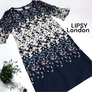 リプシー(Lipsy)のLIPSY London 花柄ワンピース S 袖シースルー 袖広がり 着痩せ(ひざ丈ワンピース)