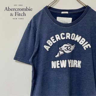 アバクロンビーアンドフィッチ(Abercrombie&Fitch)の美品！アバクロのネイビーTはシチュエーションを選ばないけどしっかり個性的(L)(Tシャツ/カットソー(半袖/袖なし))