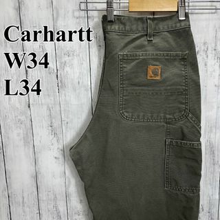 カーハート(carhartt)の【人気カラー】緑グリーン　カーキ色　サイズＬウエスト86センチ　ダックパンツ古着(ペインターパンツ)