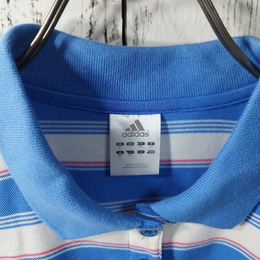 adidas(アディダス)の【adidas】ボーダー柄鹿子ポロシャツ　半袖　スポーツ　ゴルフウェア　夏　海 レディースのトップス(ポロシャツ)の商品写真