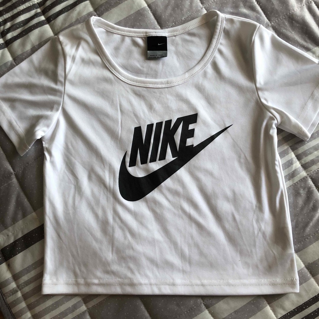 NIKE ヘソ出し　ミニ丈　Tシャツ | フリマアプリ ラクマ