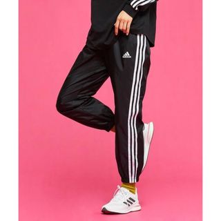 アディダス(adidas)のアディダス　エッセンシャルズ 3ストライプ 7/8 パンツ(カジュアルパンツ)