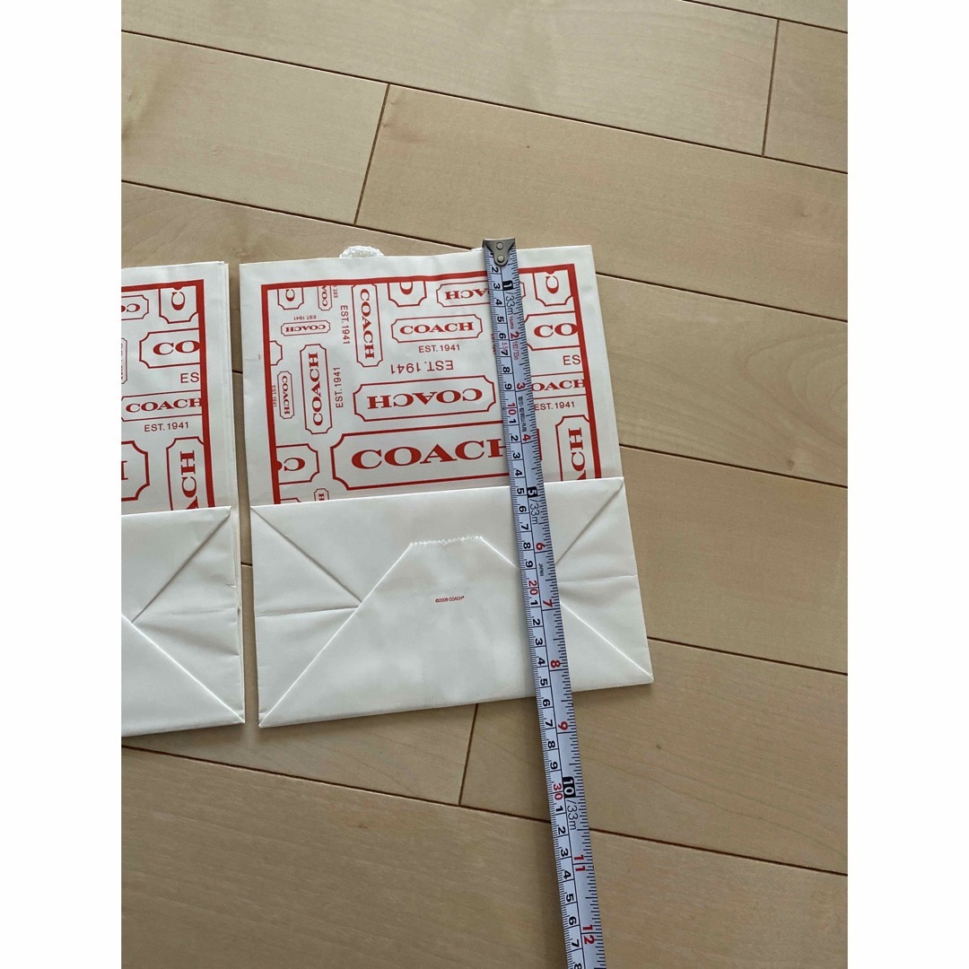 COACH(コーチ)のCOACH 紙袋　ショッパー　未使用品2枚セット レディースのバッグ(ショップ袋)の商品写真