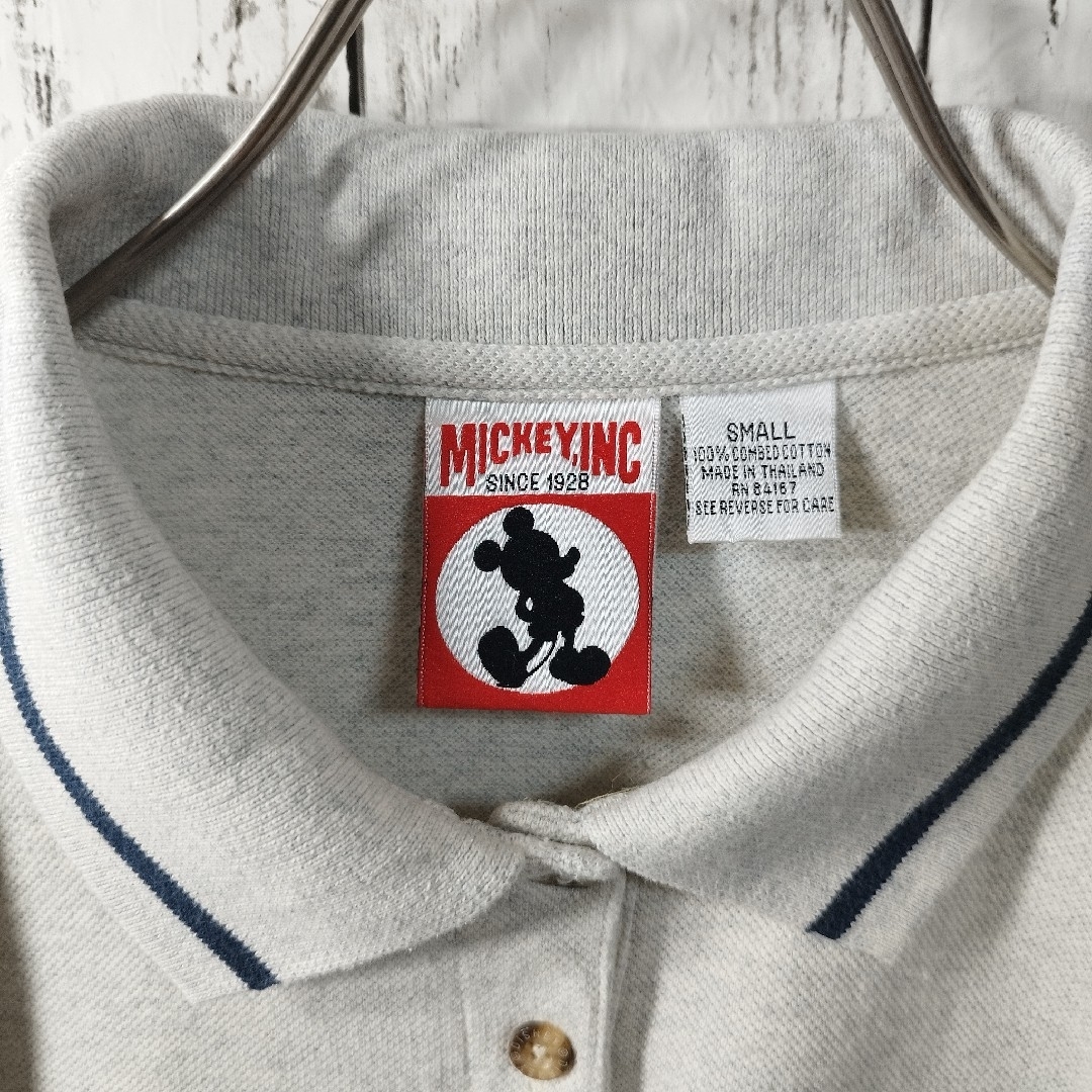 Disney(ディズニー)の【MICKEY,INC】海外ディズニー25周年ポロシャツ　半袖　ミッキーマウス レディースのトップス(ポロシャツ)の商品写真