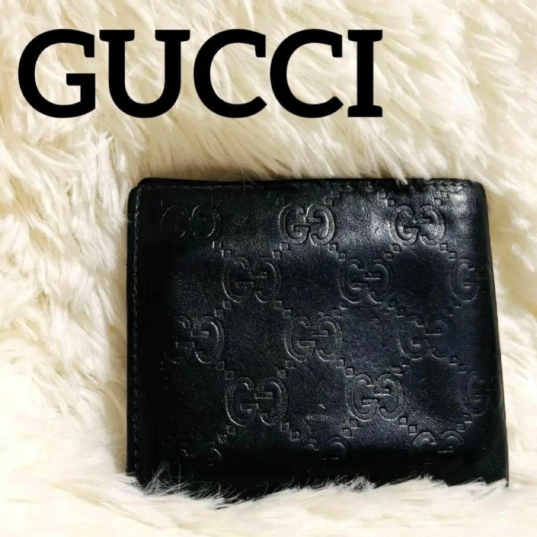 Gucci - 美品 GUCCI 2つ折り財布 シマレザー GG柄 型押し ブラック ...