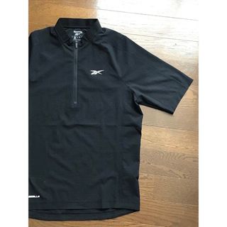 リーボック(Reebok)のReebok×レズミルズ　ジップポロ半袖【新品未使用】(Tシャツ/カットソー(半袖/袖なし))