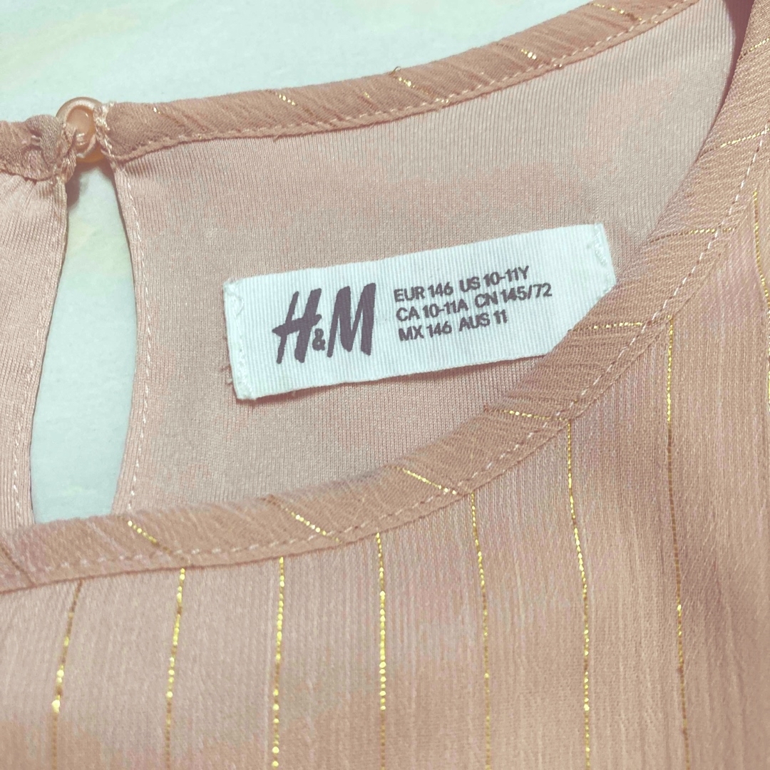 H&M(エイチアンドエム)の金糸ピンクのワンピース キッズ/ベビー/マタニティのキッズ服女の子用(90cm~)(ワンピース)の商品写真