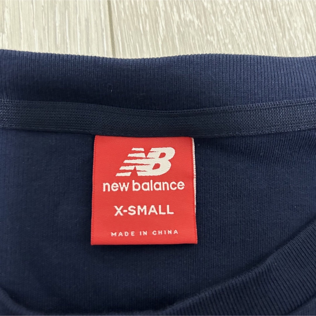 New Balance(ニューバランス)のニューバランス　Tシャツ　半袖　ネイビー　レディース　タイト　ショート丈　美品 レディースのトップス(Tシャツ(半袖/袖なし))の商品写真