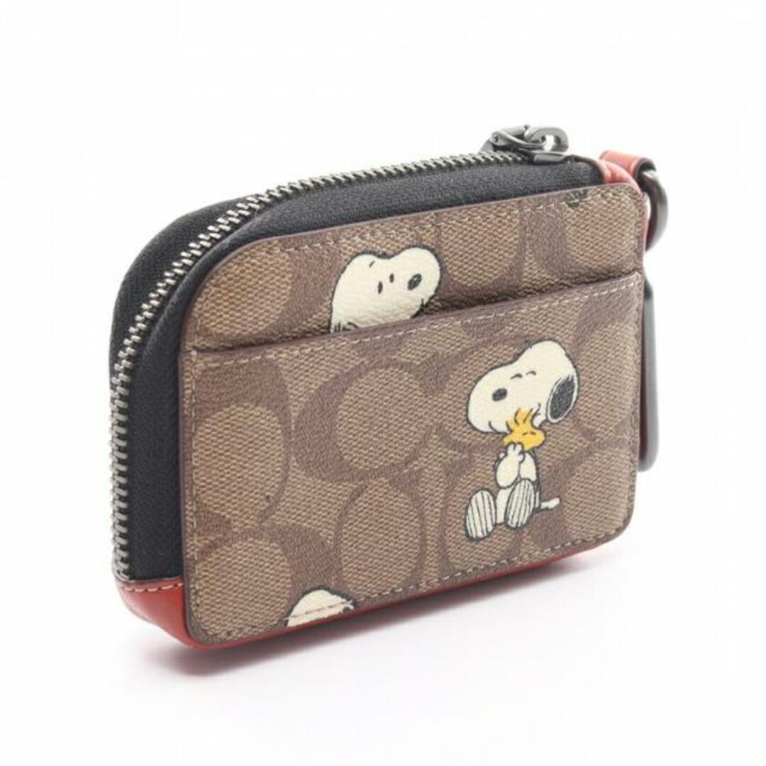 COACH(コーチ)のCOACH × PEANUTS スヌーピー Lジップ シグネチャー カードケース PVC レザー ブラウン レッドブラウン マルチカラー レディースのファッション小物(その他)の商品写真