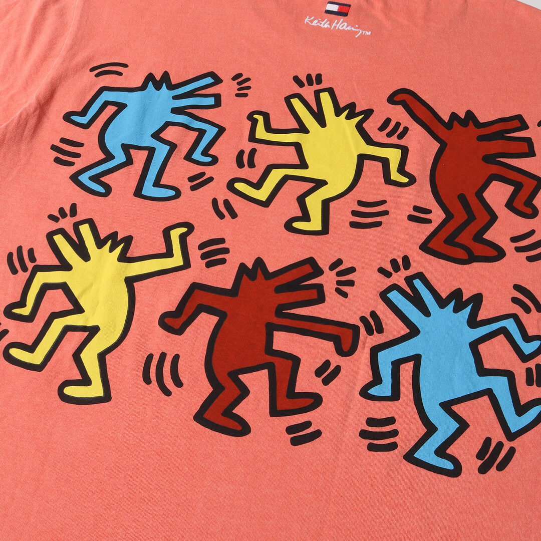 TOMMY HILFIGER(トミーヒルフィガー)のTOMMY HILFIGER トミーヒルフィガー Tシャツ サイズ:XL 23SS Keith Haring キースへリング ウォッシュ加工 グラフィック プリント クルーネック 半袖 Tシャツ サーモンピンク トップス カットソー【メンズ】【中古】【美品】 メンズのトップス(Tシャツ/カットソー(半袖/袖なし))の商品写真