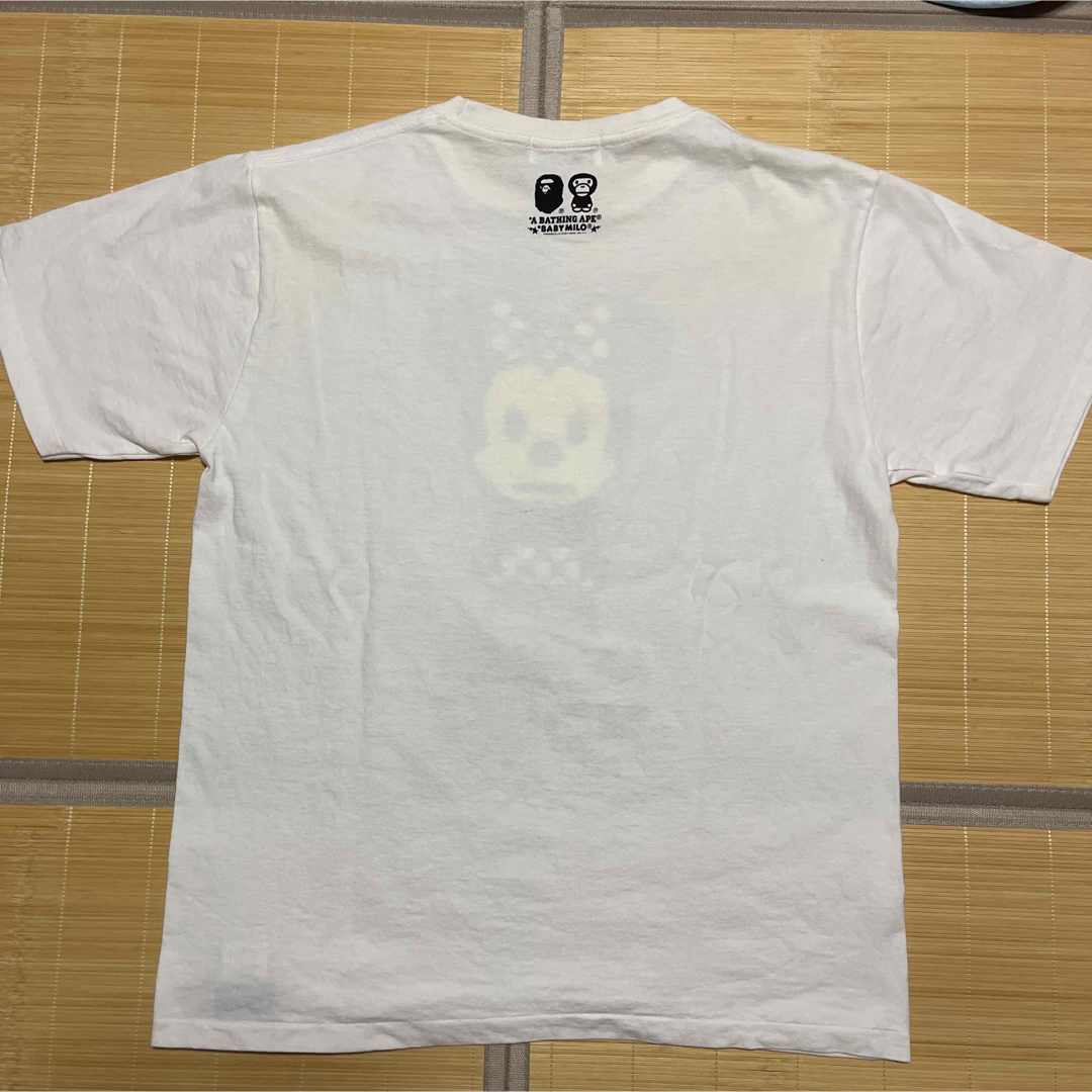 A BATHING APE(アベイシングエイプ)のAPE BAPE KAWS Disney Minnie ミニー　tシャツ　L メンズのトップス(Tシャツ/カットソー(半袖/袖なし))の商品写真