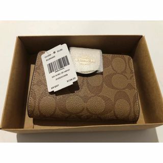 コーチ(COACH)の新品未使用 c0082 COACH コーチ 折り財布 ベージュ/ホワイト(折り財布)