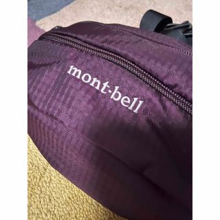 モンベル(mont bell)のmontbell モンベル ウエストポーチ 新品 美品 紫(ボディバッグ/ウエストポーチ)