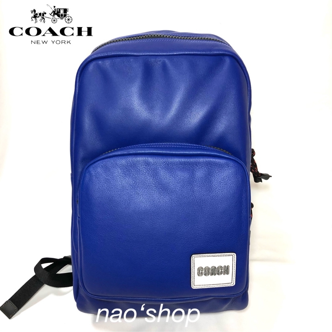 COACH(コーチ)の【新品】COACH メンズ トール バックパック パッチ ブルー メンズのバッグ(バッグパック/リュック)の商品写真