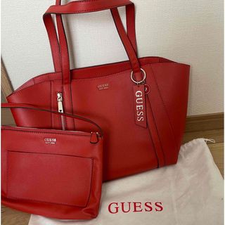 ゲス(GUESS)のGUESS トートバッグ ポーチ付き オレンジ(トートバッグ)