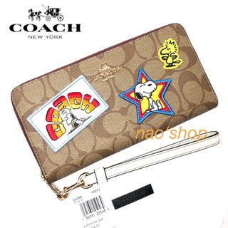 コーチ(COACH)の【新品】COACH スヌーピー ラウンドジップ 長財布 ワッペン シグネチャー(財布)