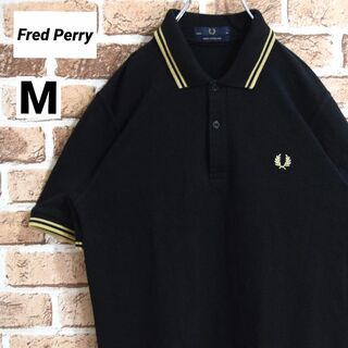 フレッドペリー(FRED PERRY)の【フレッドペリー】英国製　M12　黒×ゴールド　刺繍ロゴ　半袖ポロシャツ(ポロシャツ)
