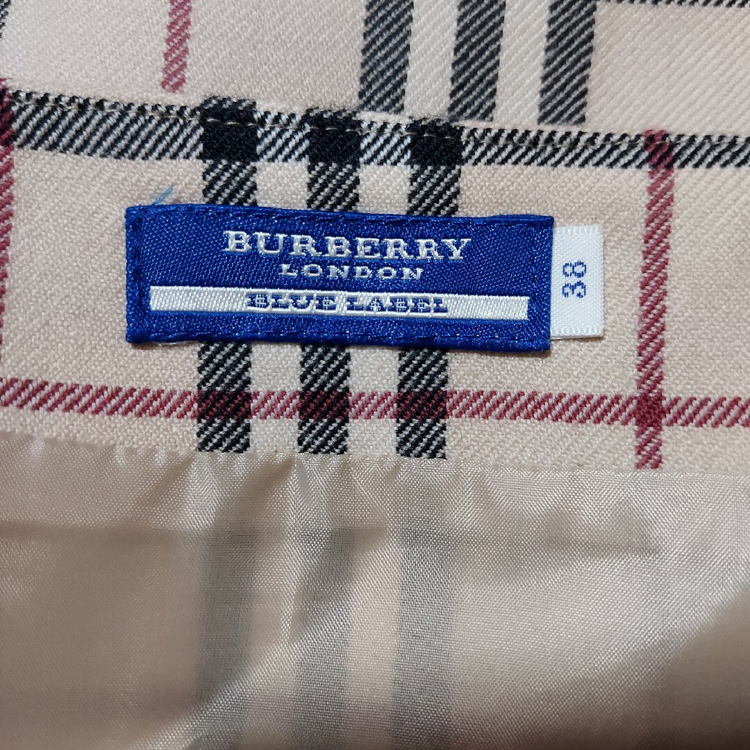 BURBERRY BLUE LABEL(バーバリーブルーレーベル)のバーバリーブルーレーベル ノバチェック膝丈スカートゴールド金具ベルト付き レディースのスカート(ひざ丈スカート)の商品写真