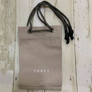 スリー(THREE)のTHREEドローストリングバッグ S ノベルティトートバッグ ミニバック(トートバッグ)