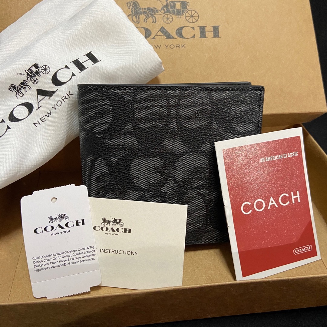 COACH(コーチ)の間もなく削除❗️コーチ スリム ブラック×チャコール ミニマル二つ折 財布 メンズのファッション小物(折り財布)の商品写真