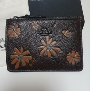 コーチ(COACH)のミニ スキニー ID ケース・フローラル プリント(パスケース/IDカードホルダー)