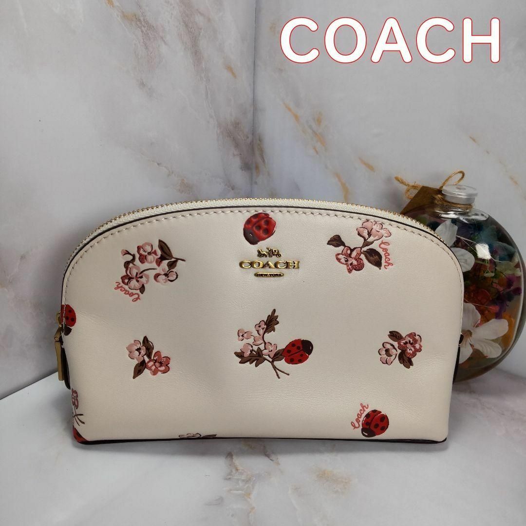 COACH フローラルコスメティックポーチ