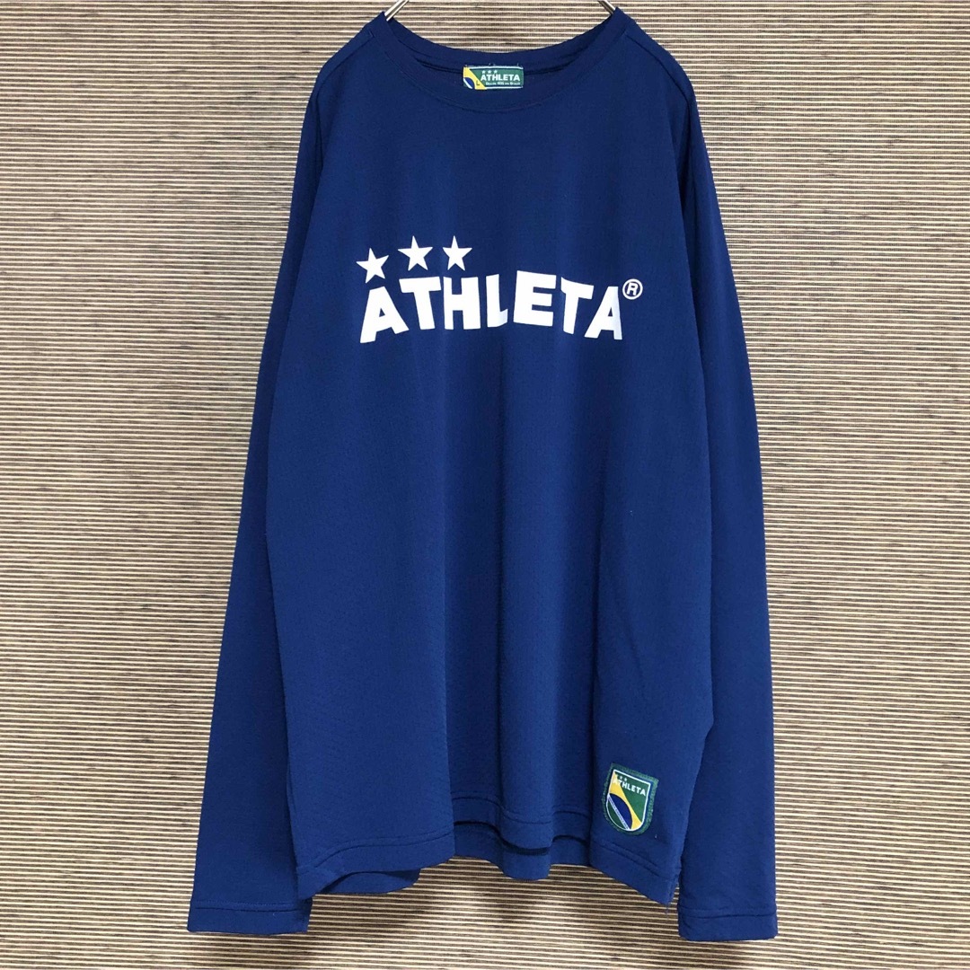 ATHLETA(アスレタ)の【アスレタ】ロンT　デカロゴ　紺色　ネイビー　プラクティスウエア　サッカーA1 スポーツ/アウトドアのサッカー/フットサル(ウェア)の商品写真