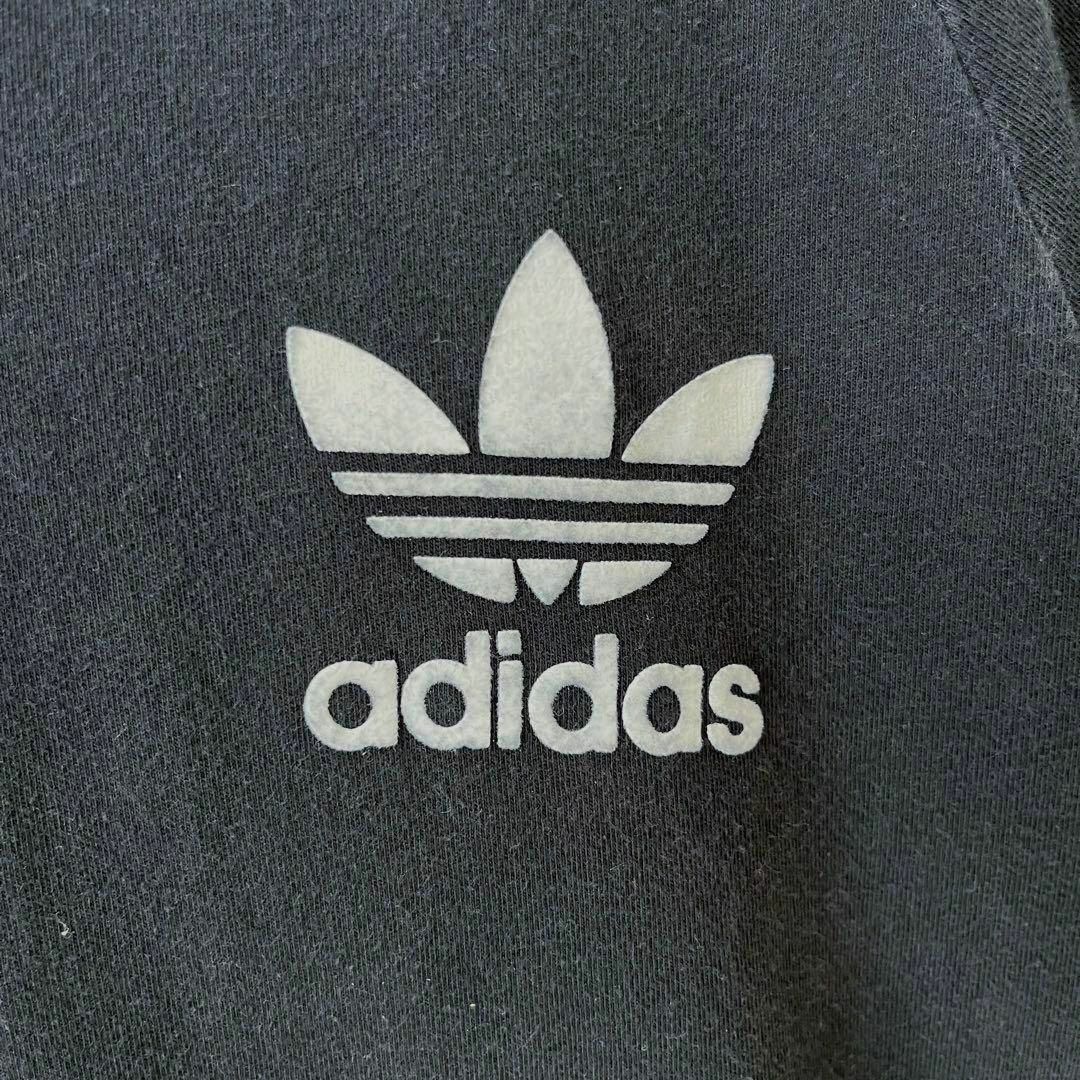 adidas(アディダス)のメンズ古着ADIDASアディダス3本ライン入りフロッキーロゴプリントリンガーM黒 メンズのトップス(Tシャツ/カットソー(半袖/袖なし))の商品写真