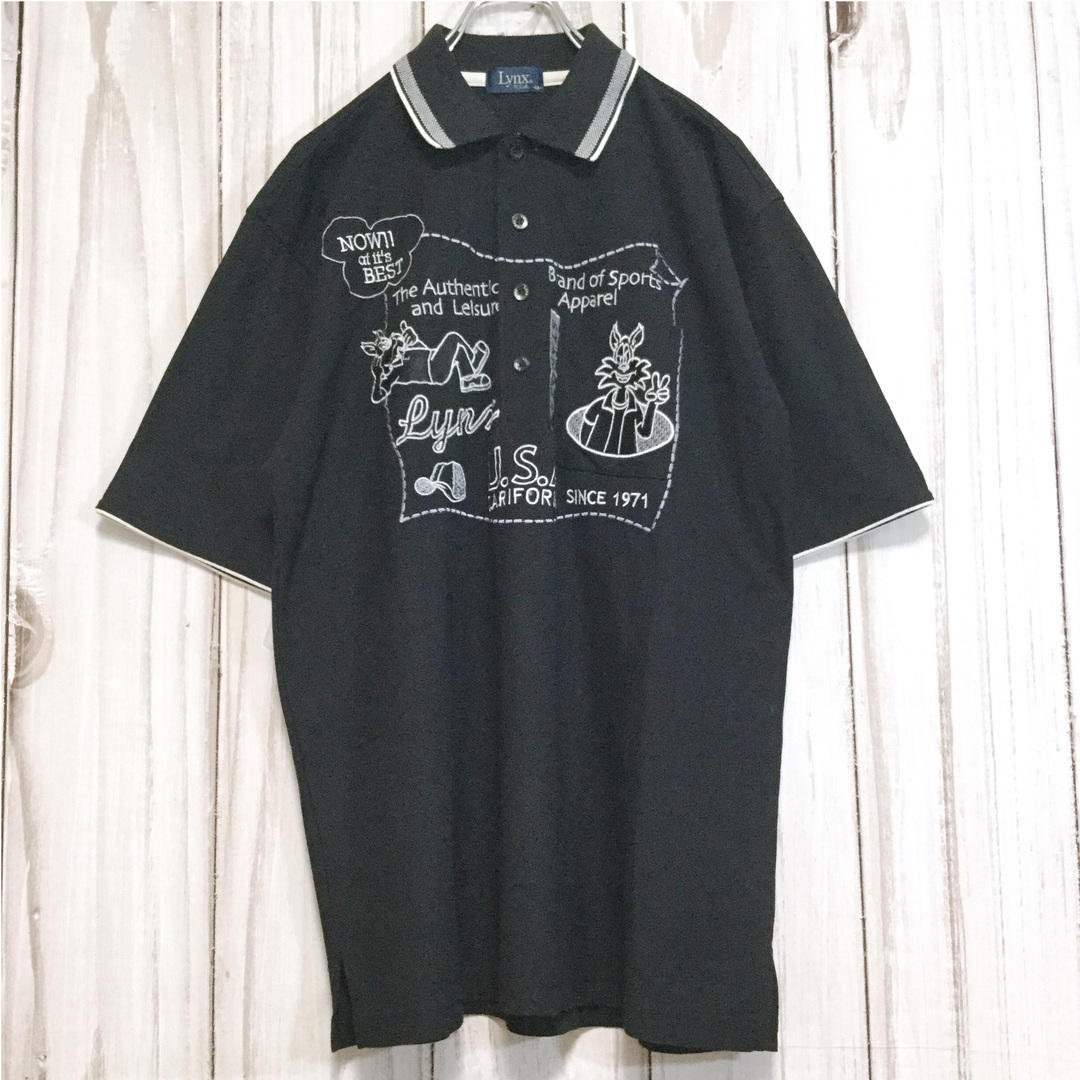 キャラクター刺繍 半袖ポロシャツ 大きいサイズ XL 襟袖ライン 黒 古着 メンズのトップス(ポロシャツ)の商品写真