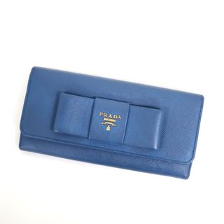 プラダ(PRADA)の【PRADA】プラダ 二つ折り長財布 リボン サフィアーノ ブルー×ゴールド金具 1MH132/tm07412tg(財布)