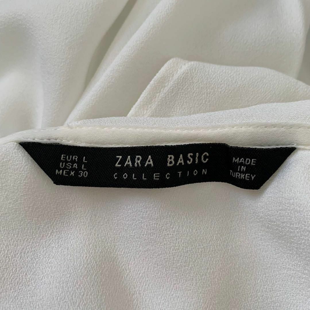 ZARA(ザラ)のZARA ザラ　フリルブラウス　ブラウス　トップス　Lサイズ　ホワイト　半袖 レディースのトップス(シャツ/ブラウス(半袖/袖なし))の商品写真