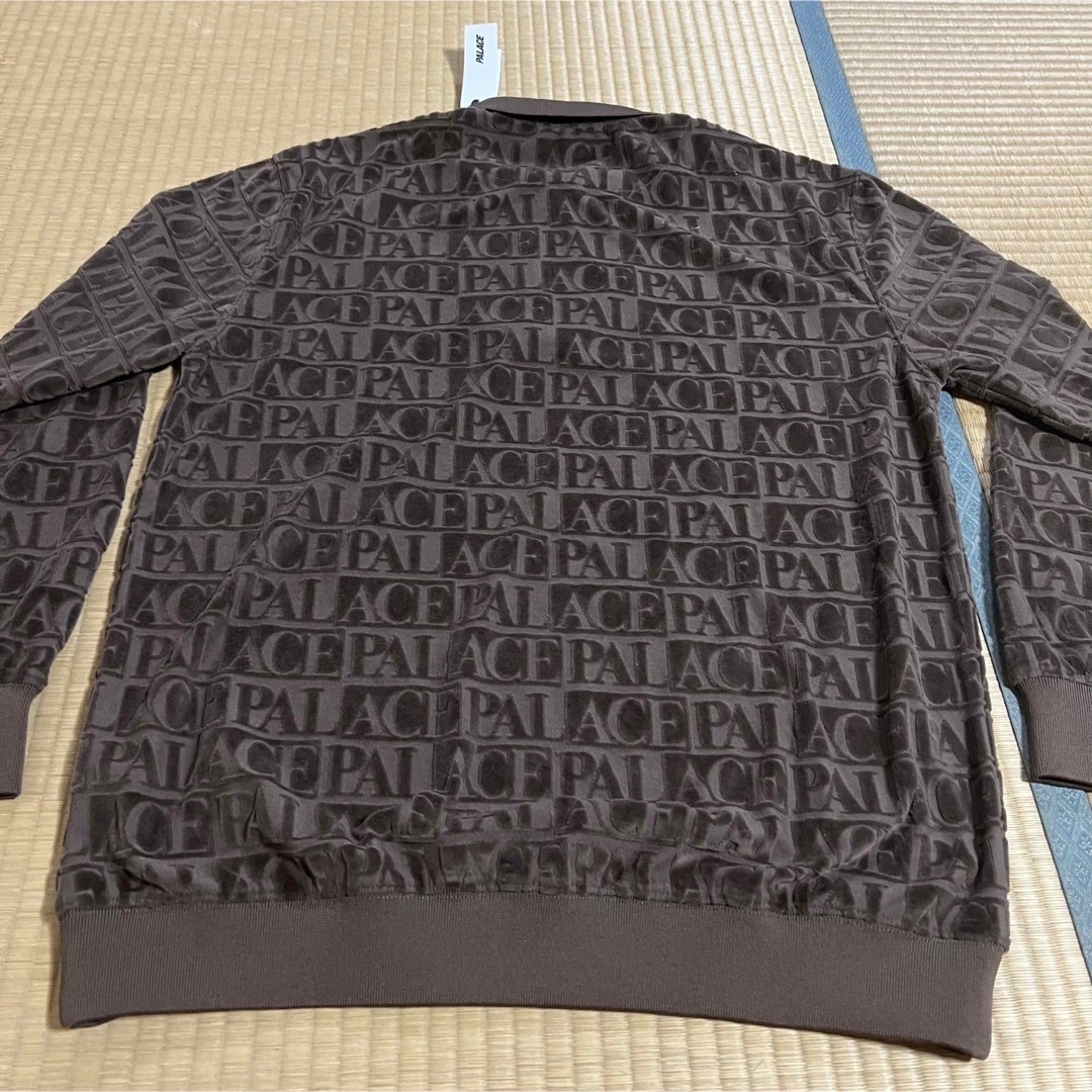 PALACE(パレス)のPALACE Domino Jacquard 1/4 Zip Polo Crew メンズのトップス(ポロシャツ)の商品写真