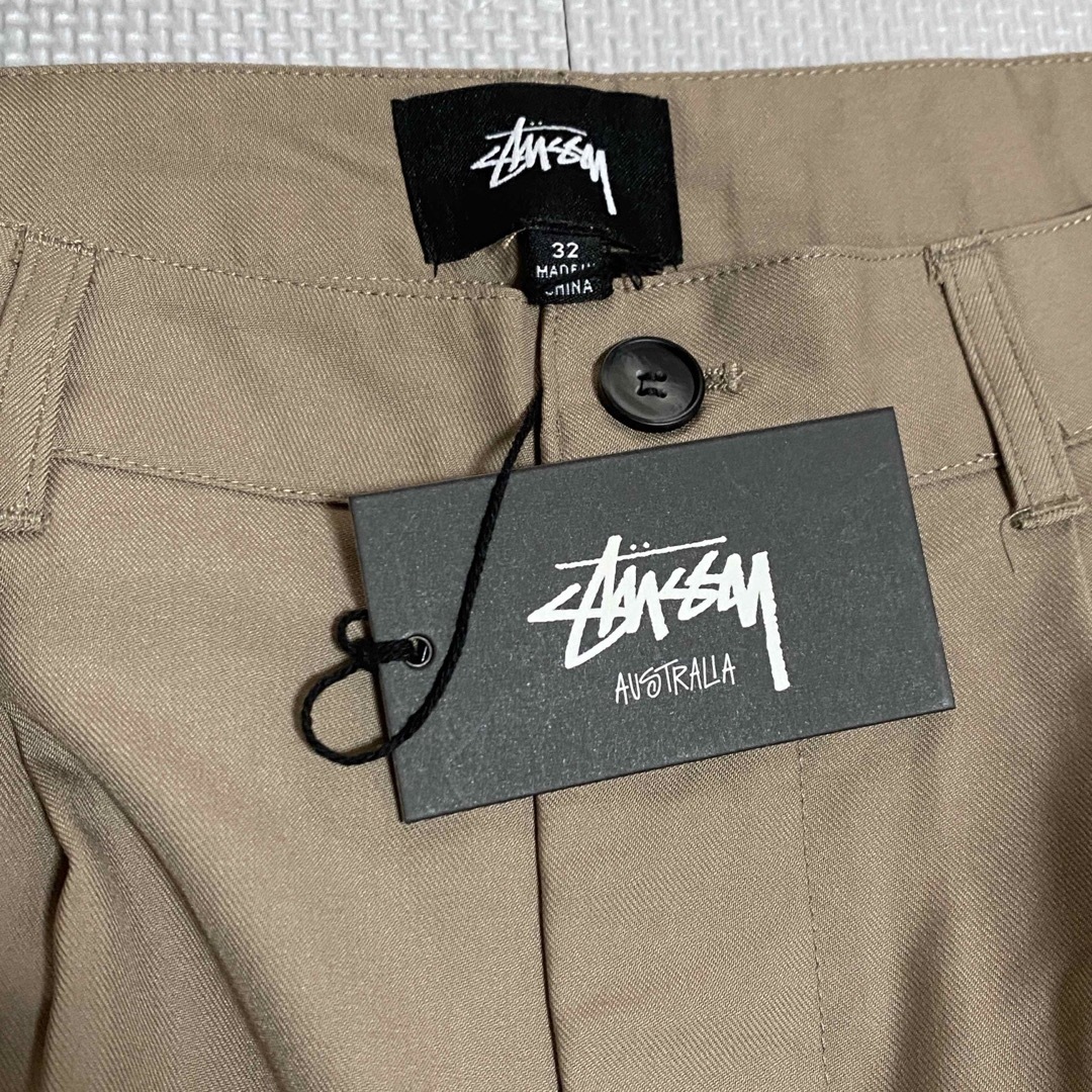 STUSSY(ステューシー)の新品　STUSSY ステューシー　ボリューム　プリーツ　パンツ　ブラウン 32 メンズの帽子(キャップ)の商品写真