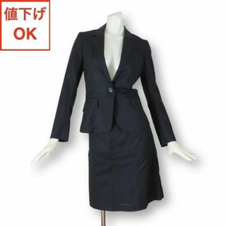 スーツカンパニー(THE SUIT COMPANY)の08【美品】ザ スーツカンパニー シー スカートスーツ 上36下38 黒 春夏(スーツ)