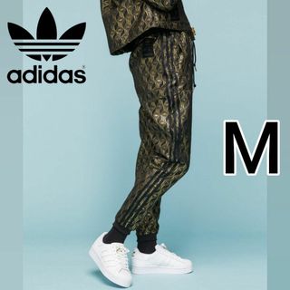 オリジナルス(Originals（adidas）)の新品 アディダス 総柄モノグラム ジャージ 女性M トラックパンツ Lisa着用(その他)