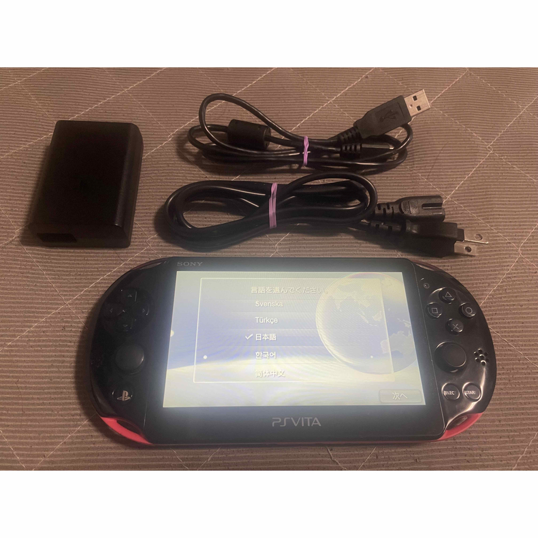 PlayStation Vita(プレイステーションヴィータ)のvita   ピンクブラック　A エンタメ/ホビーのゲームソフト/ゲーム機本体(携帯用ゲーム機本体)の商品写真