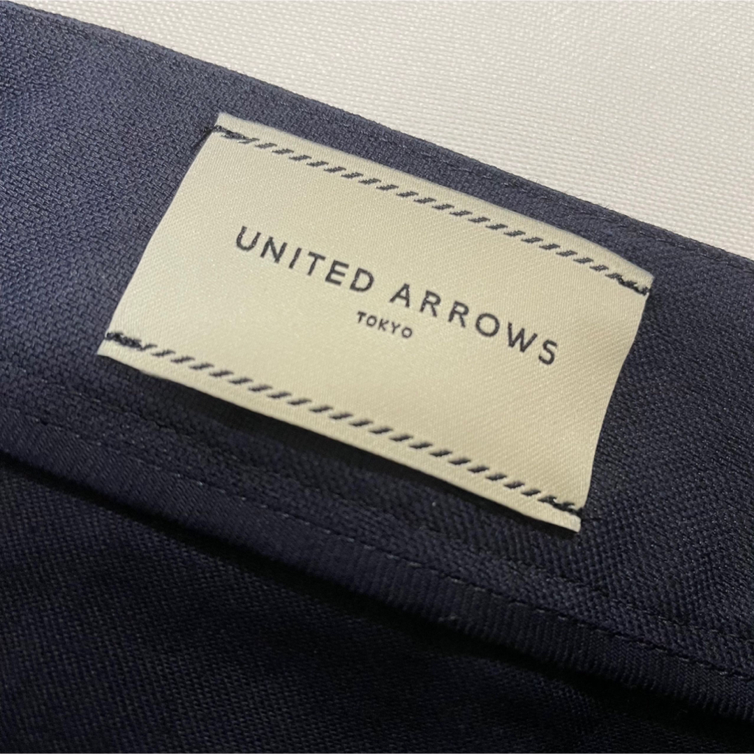 UNITED ARROWS(ユナイテッドアローズ)の【新品タグ付】UNITED ARROWSドビーカラースリムパンツ　ネイビー　40 レディースのパンツ(カジュアルパンツ)の商品写真