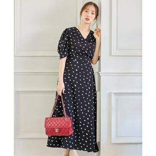 トッコ(tocco)のウエストりぼん付き袖口パール装飾ハートプリントカシュクールワンピース(ロングワンピース/マキシワンピース)