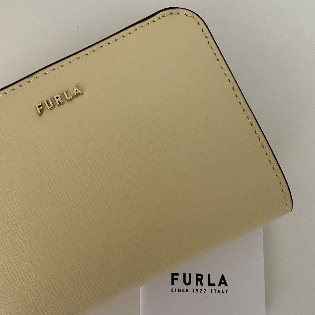 Furla(フルラ)の【新品 箱付き】FURLA BABYLON S 折り財布 UNI CREM レディースのファッション小物(財布)の商品写真