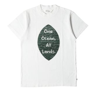 ナナミカ(nanamica)のnanamica ナナミカ Tシャツ サイズ:S One Ocean All Lands プリント クルーネック 半袖 Tシャツ USA製 ホワイト 白 トップス カットソー 【メンズ】【中古】(Tシャツ/カットソー(半袖/袖なし))