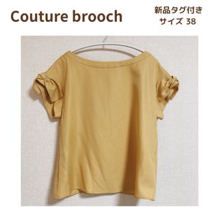 クチュールブローチ(Couture Brooch)の【couture broach】新品タグ付き 袖リボンブラウス サイズ38(シャツ/ブラウス(半袖/袖なし))