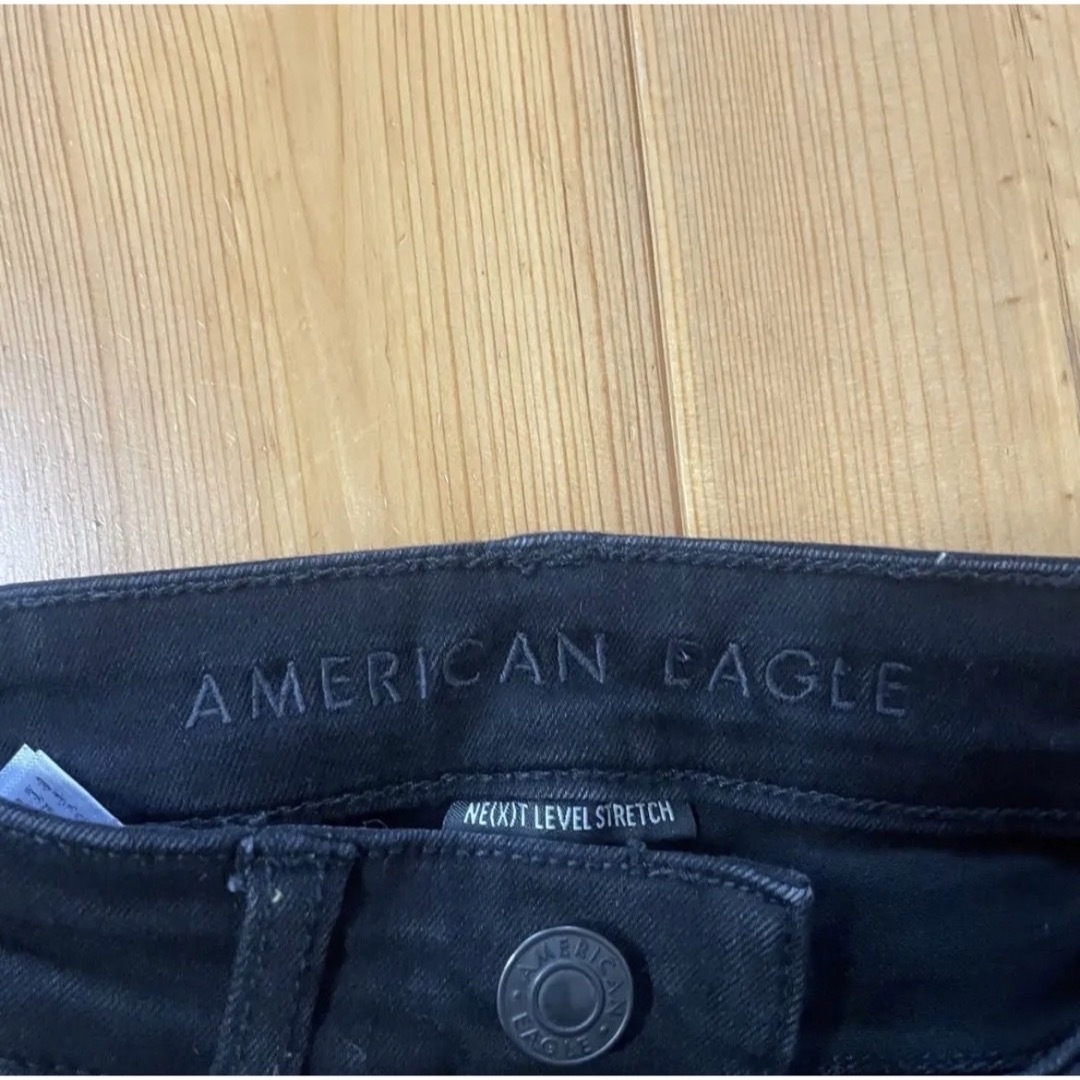 American Eagle(アメリカンイーグル)の人気モデル アメリカンイーグル ダメージジェギング 黒 0S レディースのパンツ(デニム/ジーンズ)の商品写真