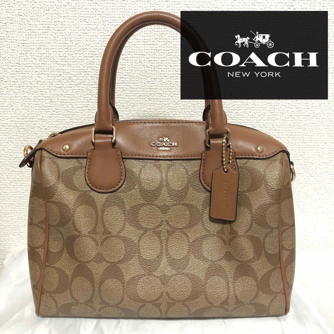 COACH コーチ ブラウン シグネチャー レザー ハンドバッグ F36702