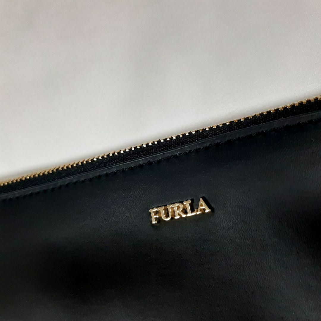 Furla(フルラ)の極美品　フルラ　花　フラワー　クラッチバッグ　ブラック　黒　レザー　革　結婚式 レディースのバッグ(クラッチバッグ)の商品写真
