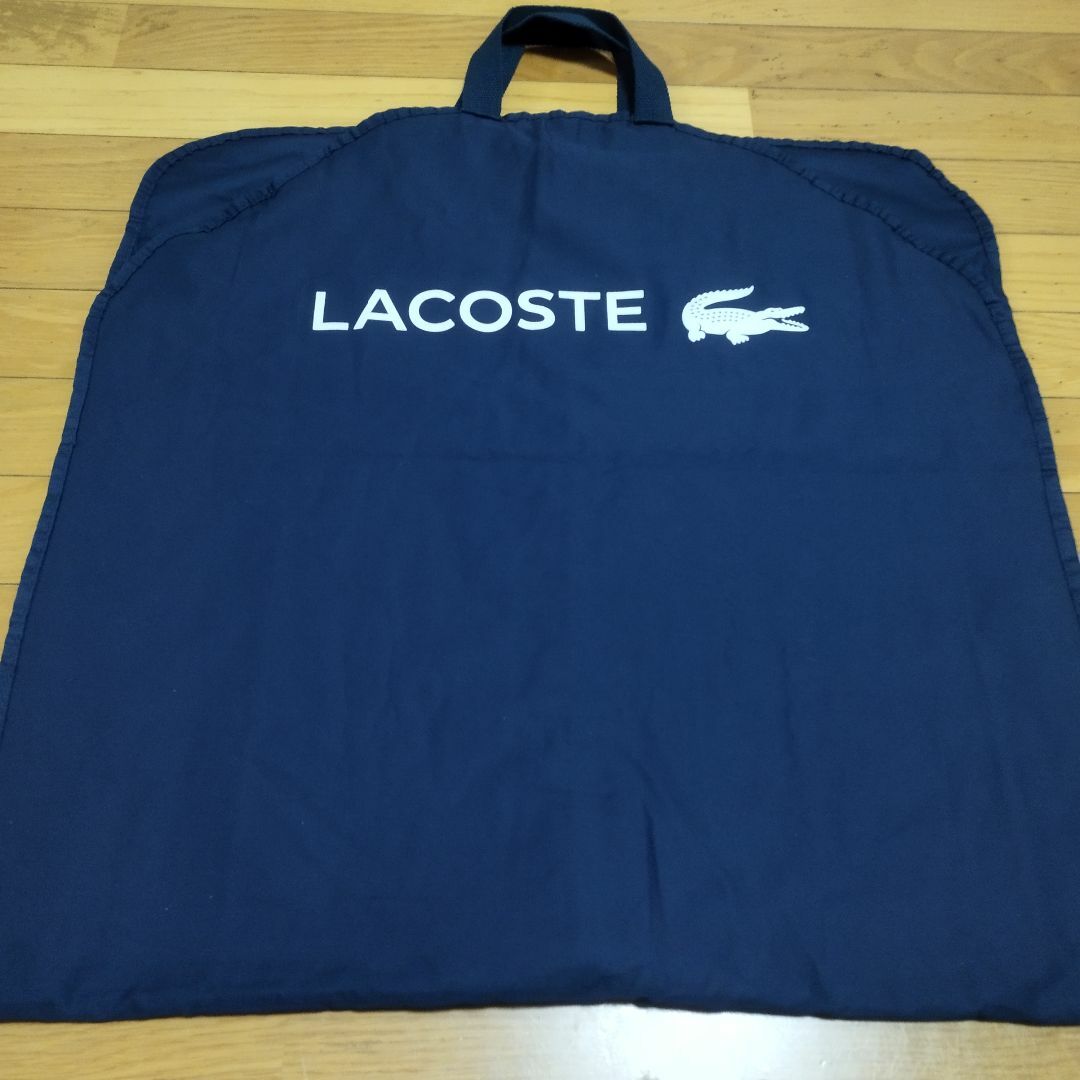 LACOSTE(ラコステ)の超美品　ラコステLACOSTE　ガーメントケース ネイビー　スーツがバー　 メンズのスーツ(その他)の商品写真