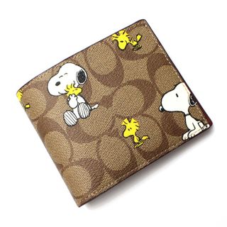 【新品・未使用】COACH コラボ 二つ折り財布 ウッドストック柄/