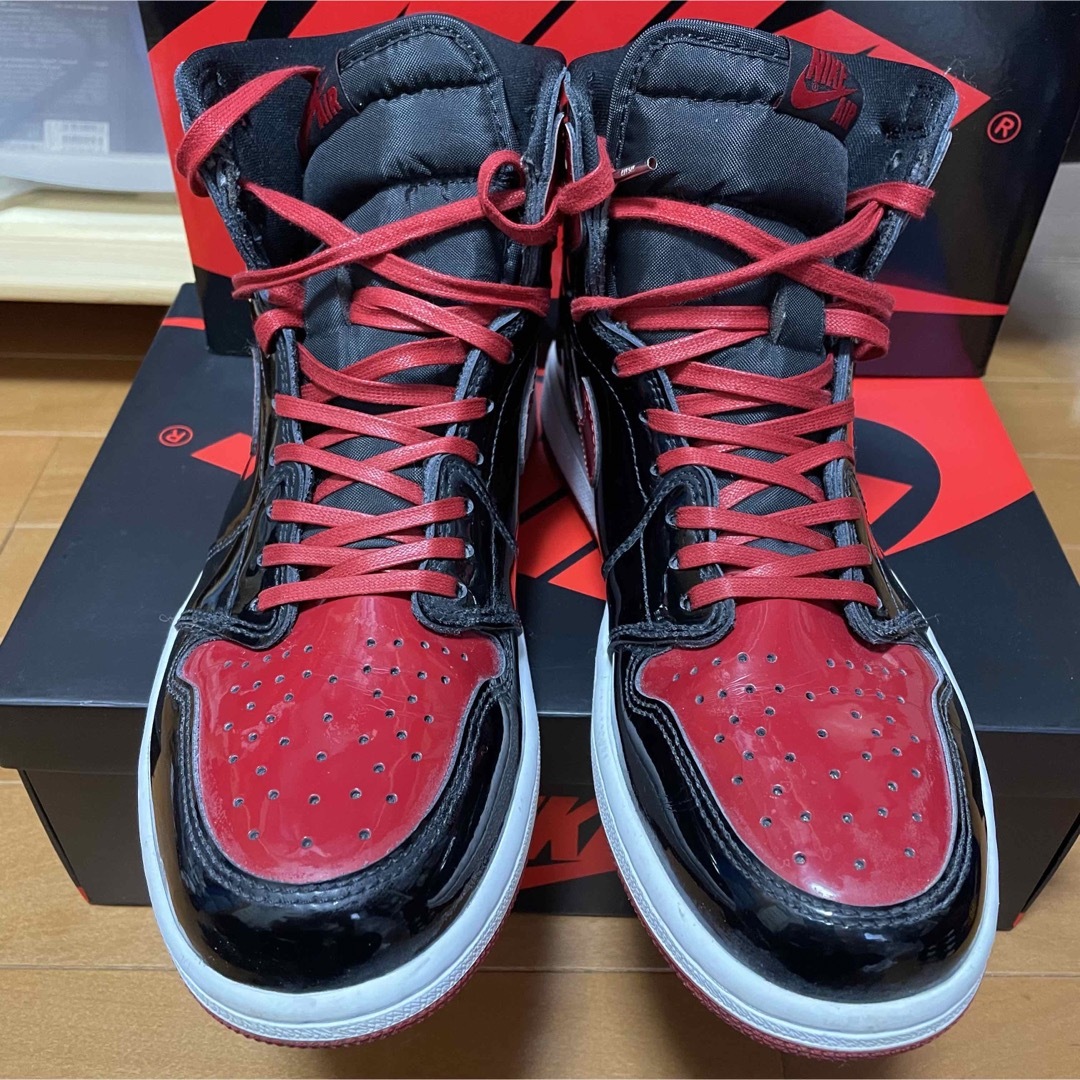 Jordan Brand（NIKE）(ジョーダン)の訳あり特価 NIKE エア ジョーダン 1 ブレッド パテント BRED メンズの靴/シューズ(スニーカー)の商品写真