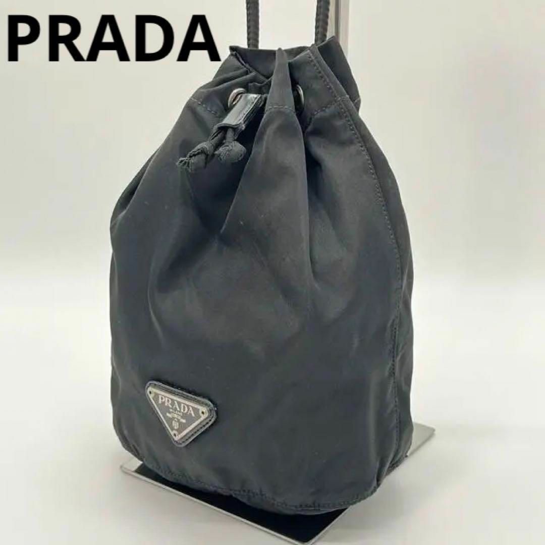 PRADA(プラダ)の美品 プラダ ミニポーチ 巾着 三角ロゴプレート イタリア製 ナイロン 正規品 レディースのファッション小物(ポーチ)の商品写真