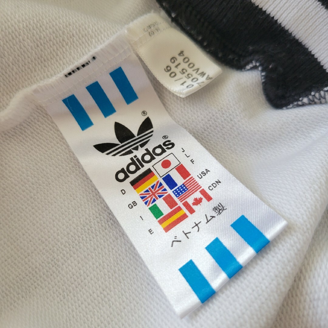 adidas(アディダス)のVintage古着 万国旗タグ adidas ハーフジップ ストライプ メンズのトップス(スウェット)の商品写真